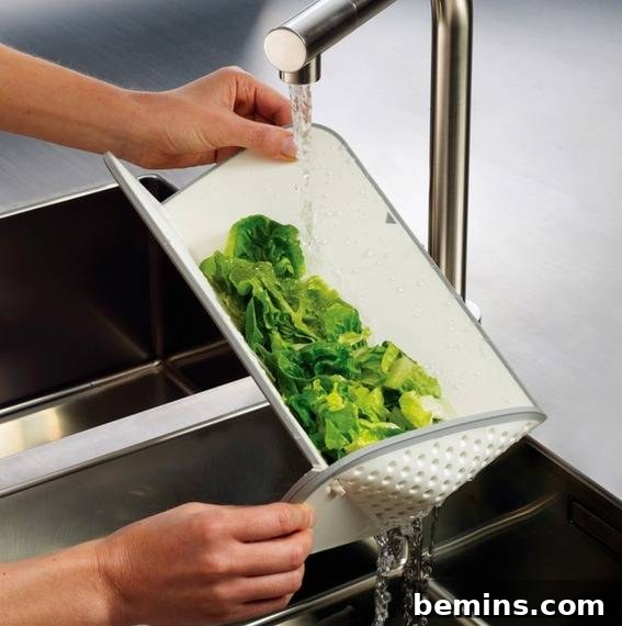 Six Kitchen Gadget Wonders for Maximizing Space 5 Woman Washing Leafy Vegetables with Washer