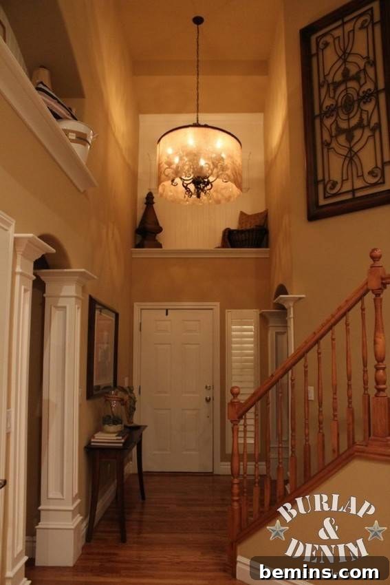 Barrel shade light on ceiling brighten the house.