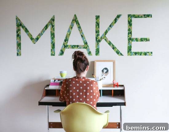 A small desk beneath a wall sign.