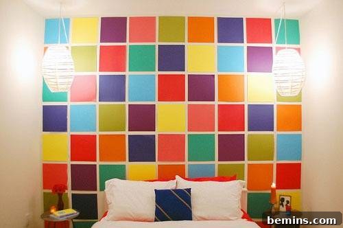 DIY Wall Decor: 10 Vibrant Art Projects to Personalize Your Space 7 A white bed in front of a colorful mosaic wall, demonstrating a bold and creative wall decor idea.