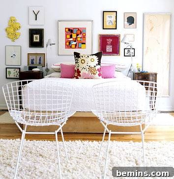 Visually Stunning Interiors: Bedrooms and Living Spaces 3 Bedroom featuring a cot, chairs, and framed wall art