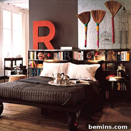 Visually Stunning Interiors: Bedrooms and Living Spaces 4 Black bed with white pillows in front of a bookshelf and broom display