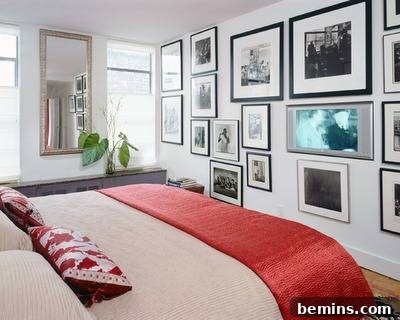 Visually Stunning Interiors: Bedrooms and Living Spaces 5 Bedroom with a bed and a wall of framed black and white photos