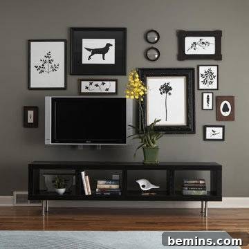 Visually Stunning Interiors: Bedrooms and Living Spaces 10 Black television table with pictures and TV on a gray wall