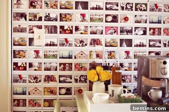 Photos arranged in a grid pattern on a wall behind a light switch, creating a unique and personalized wall decor.