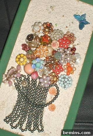Flower Jewelry Basket: An inspiring example of using junk jewelry to create a beautiful flower basket art piece.