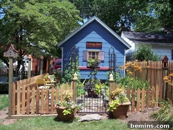 A charming vegetable garden thrives in a small backyard space, showcasing the beauty of potager design.