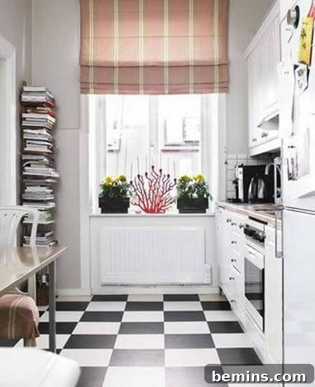 A small room has a black and white checkered floor and a window with flowers on the sill.