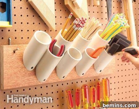 Garage Makeover: 10 DIY Organization Hacks 5 PVC pipes mounted on a wall acting as individual tool holders.
