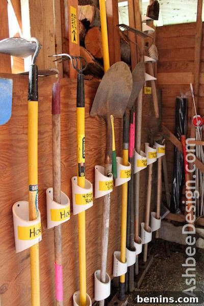 Garage Makeover: 10 DIY Organization Hacks 10 Garden tools hanging on a wall using PVC pipe holders.