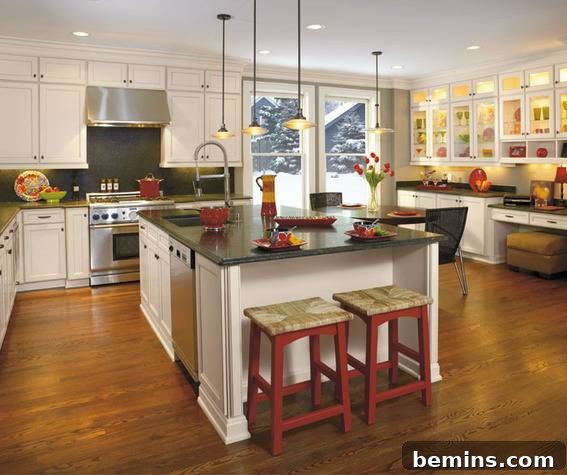 A large kitchen with an island and lots of cabinets.