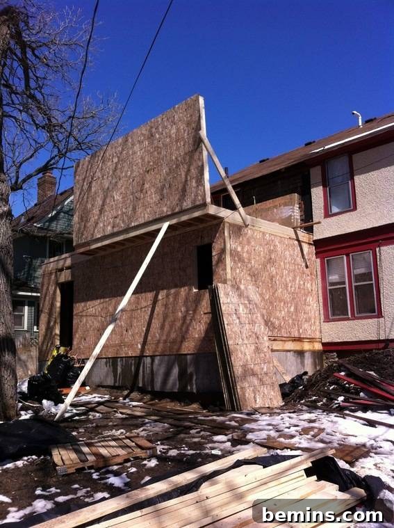 The interior framing of a house being created.