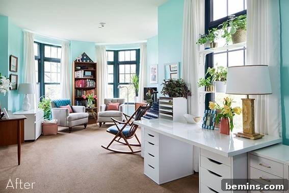 An eggshell blue living room in a senior residence, featuring comfortable chairs and a desk, designed to create a peaceful and inviting atmosphere.