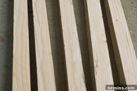 Cut lumber for the garden row protectors.