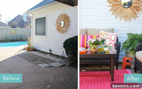 A pool house with a couch and colorful pillows outside it.