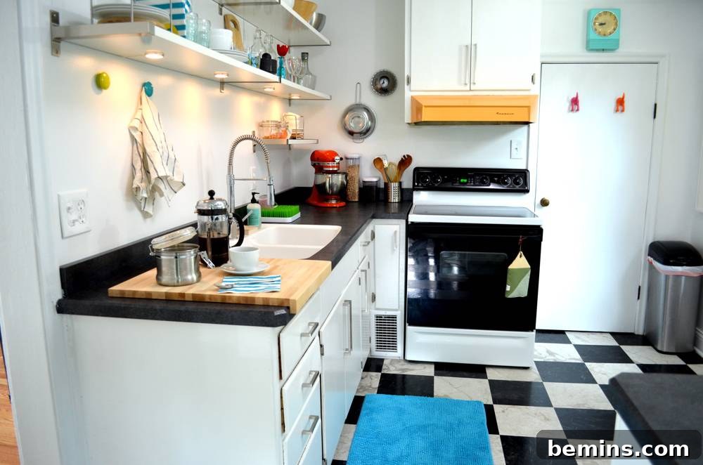 The completed kitchen with a stylish black and white checkered floor.