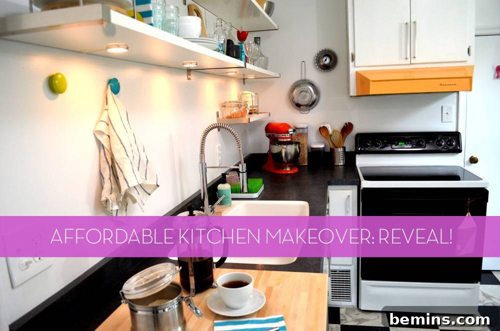 During: A kitchen with white walls and cabinets, and a black stove.