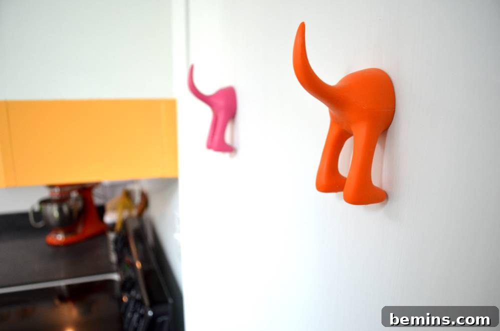 Playful puppy-dog tail apron hangers adding a splash of fun.