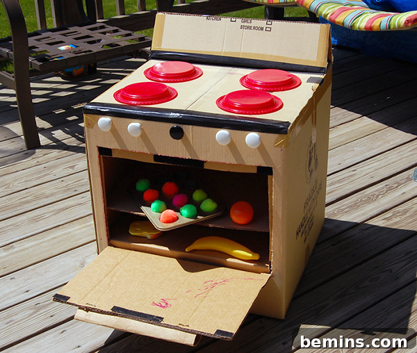 Cardboard Creations: 12 DIY Play Projects for Kids 11 A charming child's oven crafted from cardboard and other materials.