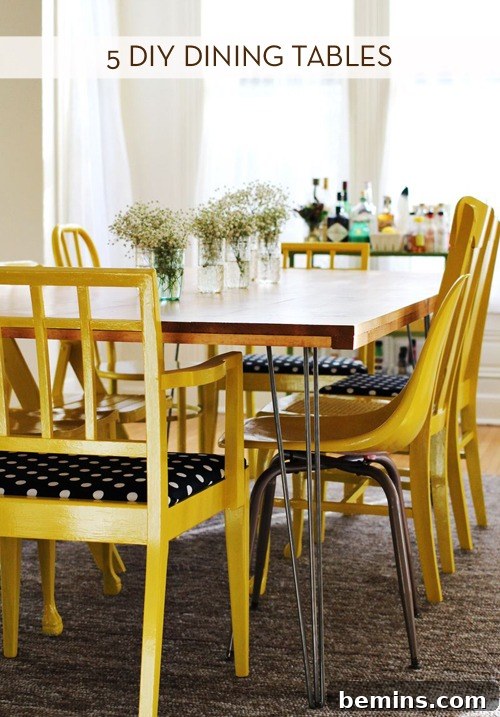 A stylish dining table with yellow and black chairs, showcasing modern design.