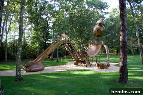 Playgrounds Reimagined: 5 Modern Wonders for Kids 6 Slides are in the grassy area of a park.