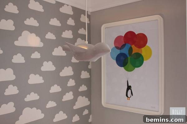 Balloons are lifting a penguin in a piece of art on the wall.