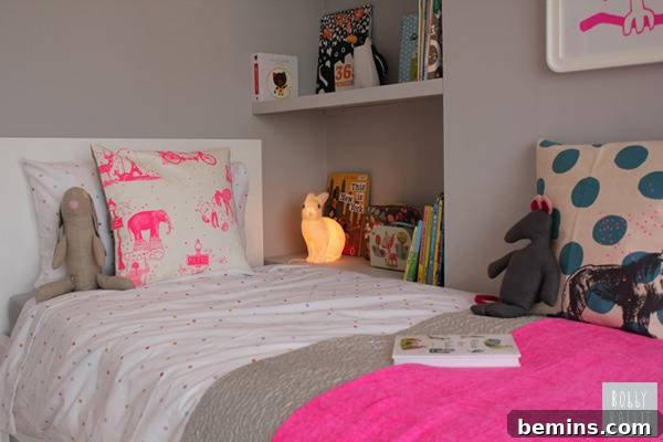 A twin size bed next two a bookcase.