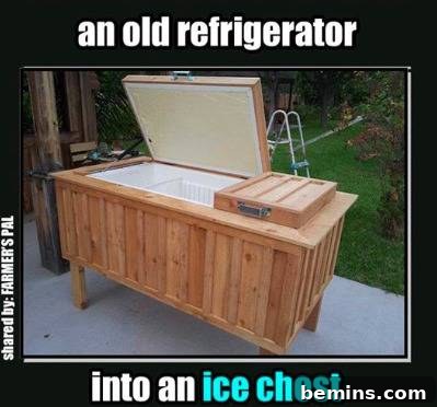 A wooden ice chest has an open door.