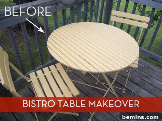 Round light wood bistro table with two chairs around it sitting on a wooden deck. A perfect outdoor dining setup.
