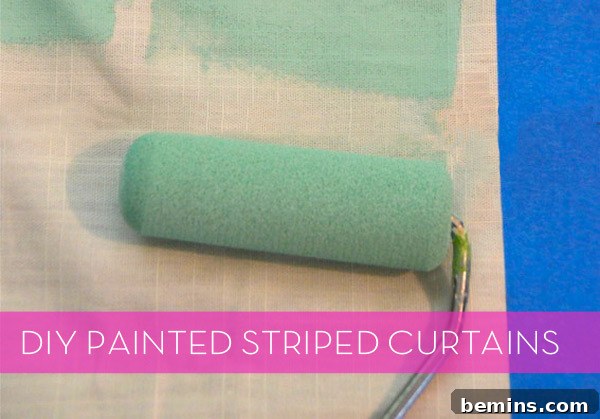 Painted Stripes: A Curtain Refresh 2 A lime green paint roller paints on white curtains, showcasing the beginning of the DIY striped curtain project.