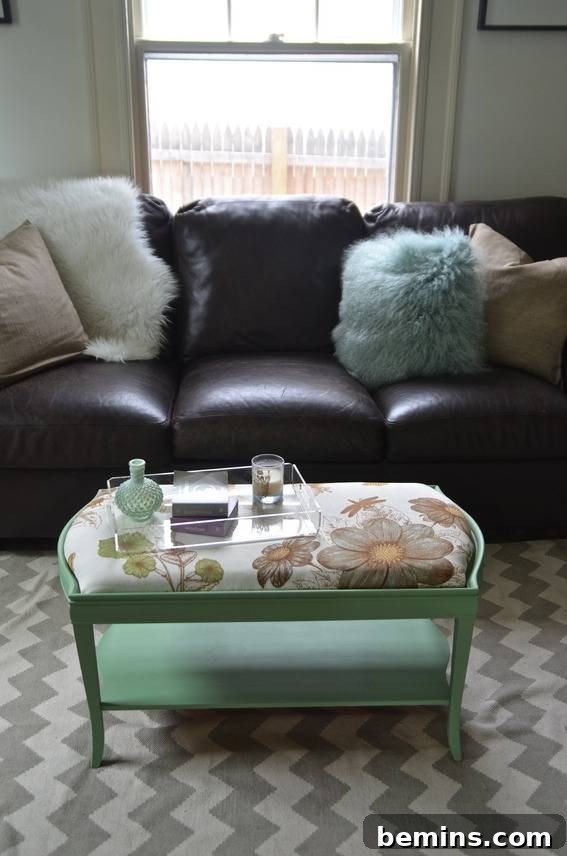 A sofa sits behind the transformed coffee table ottoman, showcasing its new life