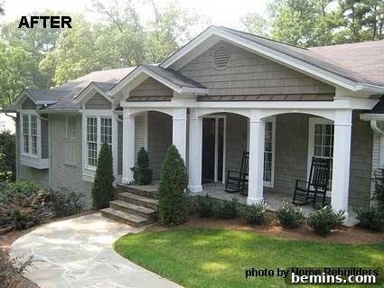 A welcoming drive leading to the steps of a two-story house, highlighting the improved accessibility and aesthetic appeal after the front porch addition