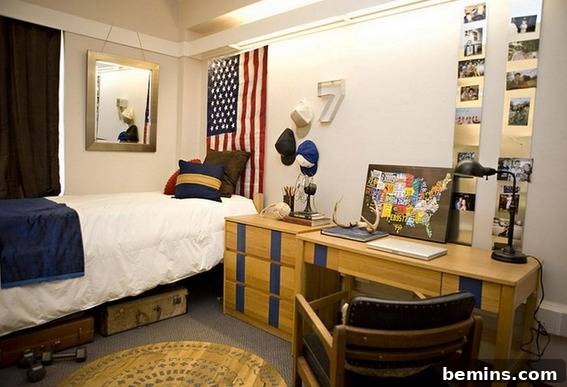 A room featuring a wood table and dresser, along with a bed and an American flag, creating a patriotic and functional living space.