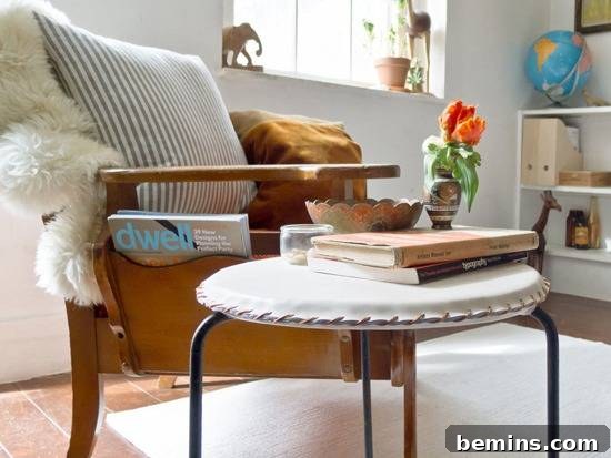 Leathercraft Dreams: 11 DIY Projects to Ignite Your Creativity 4 A brown chair is sitting by a round white table with black legs.