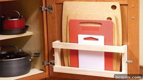 DIY Kitchen Organization: 10 Clever Projects 11 Cutting boards stored in a magazine rack inside a cabinet