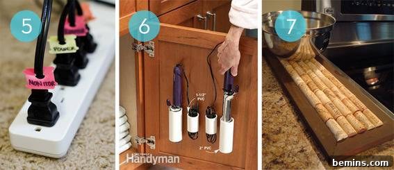 Plugs with tagged cords in a surge protector next to hair styling tools on cupboard door. Organization and safety tips.