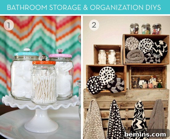 Cotton balls and ear swabs in decorative jars on a cake plate in a well-decorated bathroom.