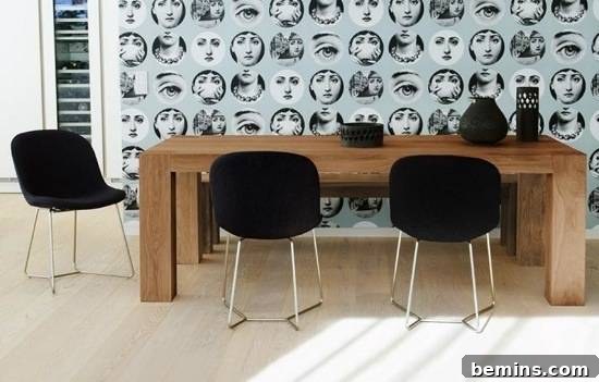 Dining Room Renovation: Expert Tips and Creative DIY Projects 4 Wooden table with black chairs around it in front of an illustrated wall.