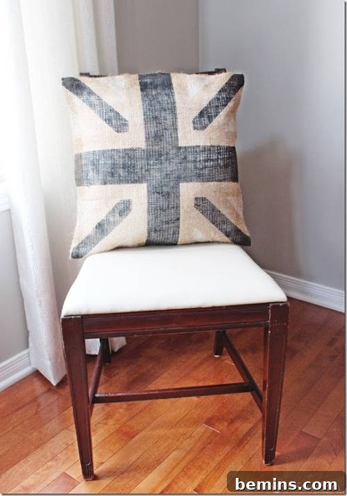 A homemade pillow made with different types of fabrics.