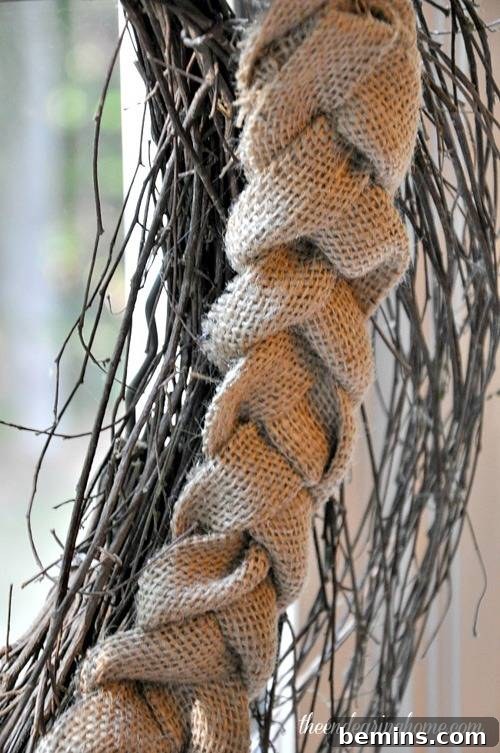 A braided piece of burlap next to twigs.