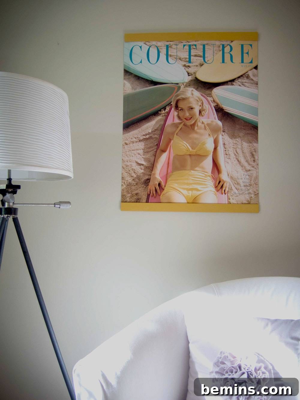 The completed DIY poster hanger, showcasing the beauty and functionality of using reclaimed wood in home decor.