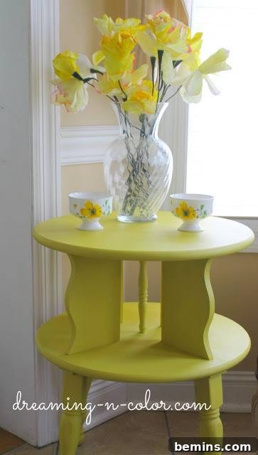 An End Table decorated with Yellow Stools and Yellow Flowers