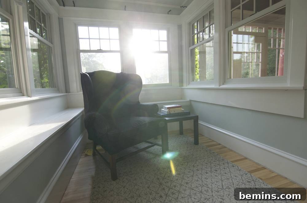 Sunroom with new windows and fresh paint.
