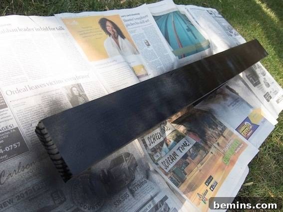 Craft a Rustic Chalkboard Card Display from Reclaimed Wood 11 Chalkboard Greeting Card Holder from Scrap Wood The finished chalkboard greeting card holder, painted and ready to display greeting cards.