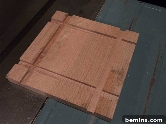 Geometric trivet board made with scrap wood, showcasing the partially completed pattern after the first set of cuts