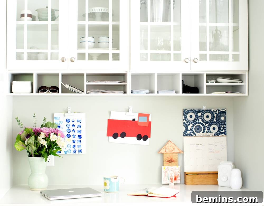A kitchen counter has been turned into an office space.