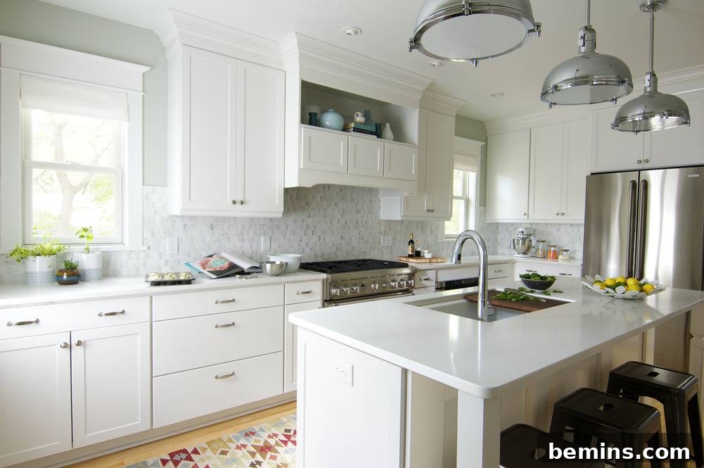 All white, modern styled kitchen.