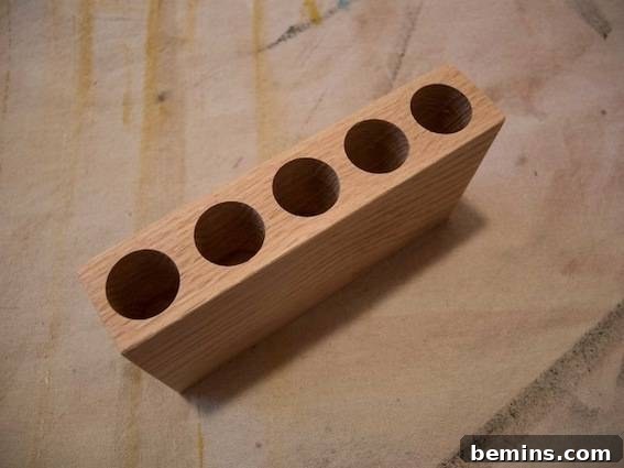 Wooden test tube holder with holes drilled