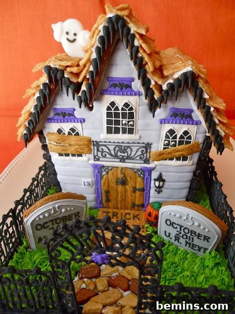 This gingerbread house has a Halloween theme.