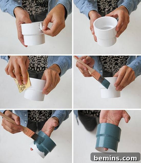 A woman repaints a small white planter a modern blue color.
